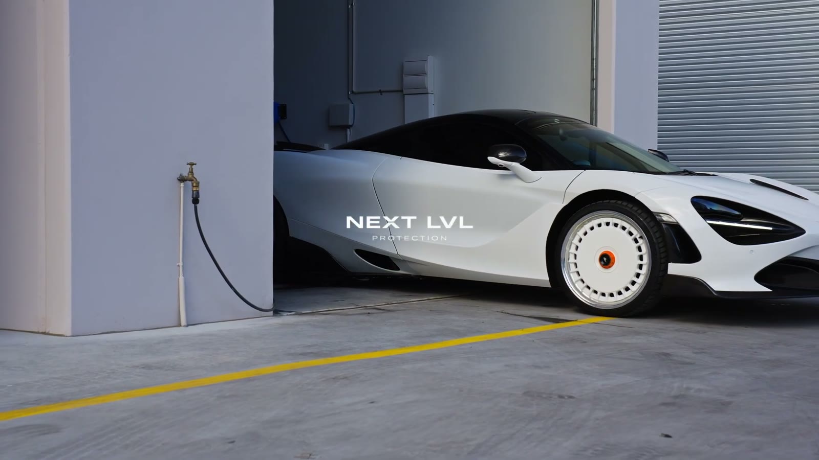 Before — McLaren 720S — in the bay, then finished outside