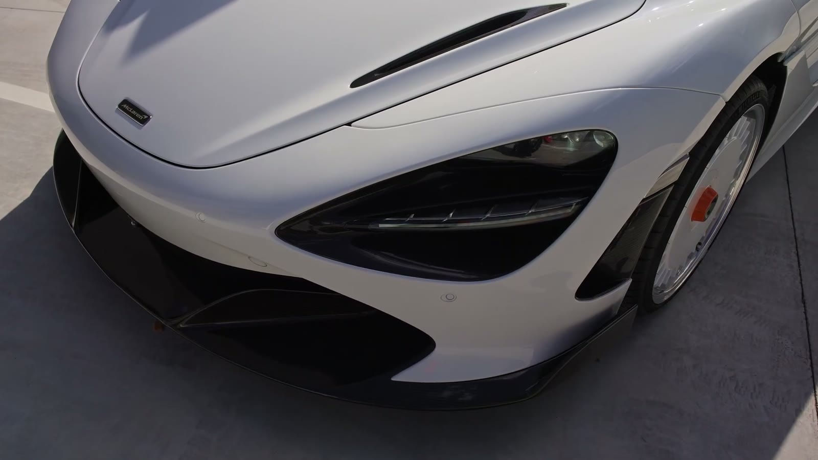 White McLaren 720S parked in the Next LVL Protection bay in Acacia Ridge before the install