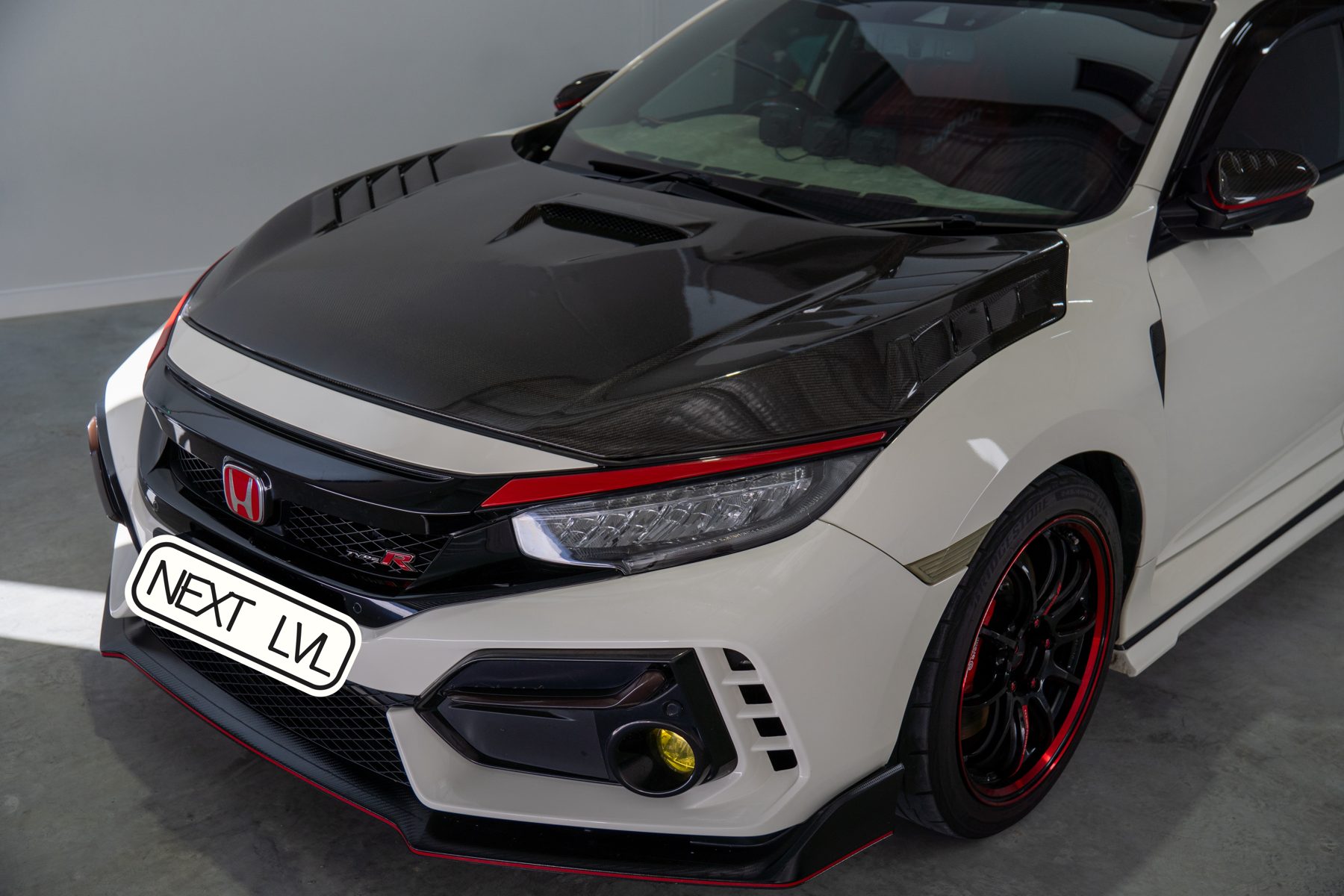 Honda Civic Type R with Next LVL plate outside the Acacia Ridge studio